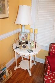Antique white painted table, vintage-style telephone, large porcelain lamp