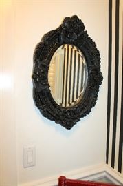 Black ornate mirror