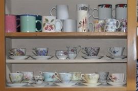 Tea cups and saucers, coffee mugs.