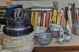Old cookbooks, modern spongeware, assorted dishes.