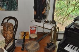 Musical instruments including ukukulees, oversized recorder, trumpets, etc.