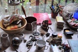 Dazey glass #40 butter churn, box of Schiaparelli new nylon stockings, matchbooks, stir sticks, pottery