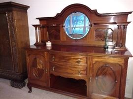 antique buffet with spoon feet, loads of storage here, mirror is in terrific shape
