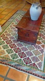 rug, chest, pottery
