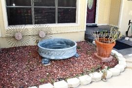Fountain Base, Sun Wall Hangings, Large Pot of Crotons