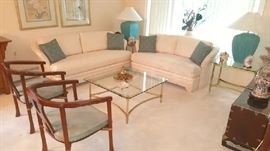 main room with sofa set, club chairs, oversize Asian lamps and watercolor on silk.
