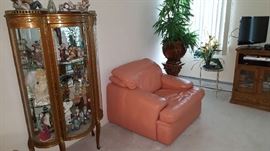leather chair with French Provincial curio
