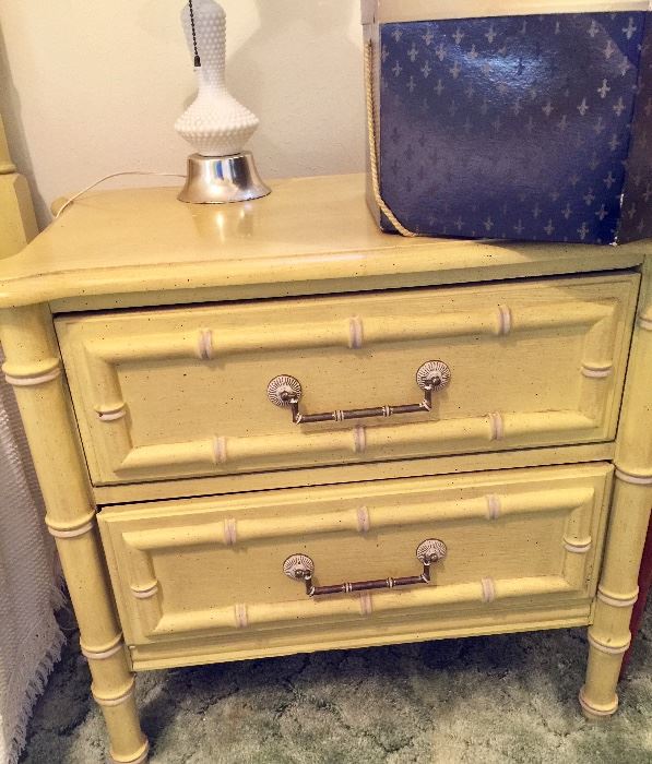 Yellow "bamboo" detailed night stand. This is part of a bedroom suite. 
