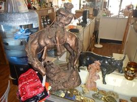 Cowboy on horse made by Austin Productions or crushed marble.