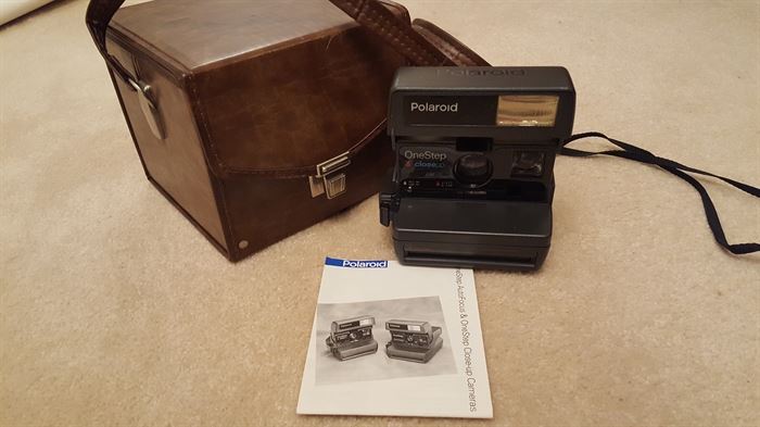 Several Polaroids available with boxes