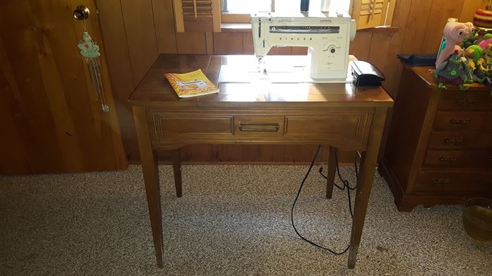 Singer Signature sewing machine, in table