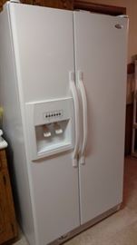 Nice white Whirlpool side by side refrigerator