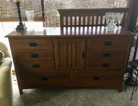 nice dresser with mirror (mirror behind dresser)