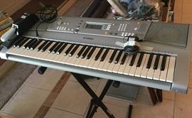 Yamaha electric keyboard and stand
