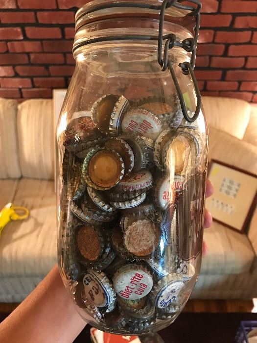 Large jar of cork lined bottle caps 