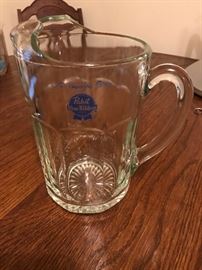 This is the real deal. A glass Pabst Blue Ribbon Beer pitcher.  Not plastic!