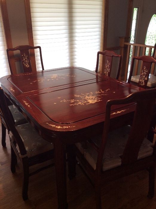 Incredible Chinese Rosewood Table with leaves, 6 chairs. Mother of Pearl Inlaid Design.  Custom designed cushions