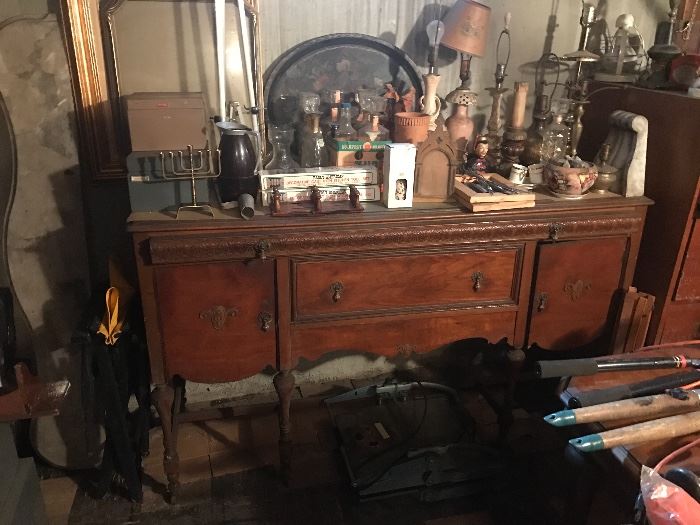 ANTIQUE SIDEBOARD AND SOME OF MANY LAMPS