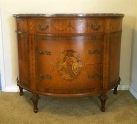 French demi lune chest with marquetry inlaid decoration