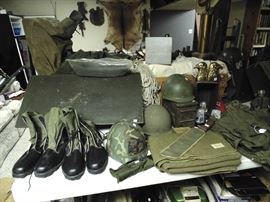 Brand new vintage combat boots, helmets, machete,ammo boxes butt packs, wool blanket