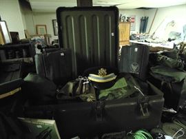 Dress hats, inflatable air mattresses from wwII, 1/2 tents, cammo ponchos, metal field lockers