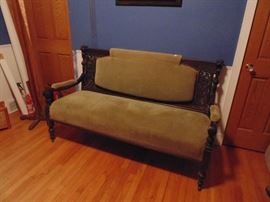 Gorgeous carved settee with lion heads