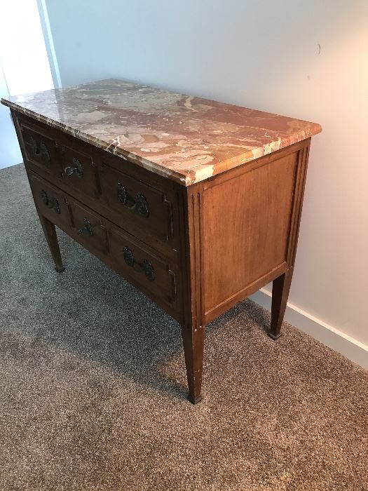 Two drawer dresser with marble top. Bronze pulls and escutcheons with keys. Made in Italy for Bloomingdales. Purchased in 60's in NYC. 42" X 19". 32" high. In good shape. $400