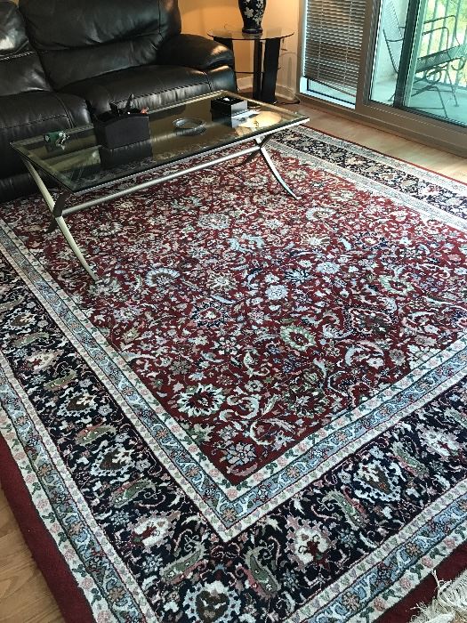 Red with blue and cream Oriental rug. Thick and plush. Open field. 9' X 12'. In Excellent shape. No pets or smokers. $500