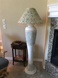 Floor lamp 61 tall, has small chip on base 