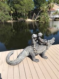 Awesome pet gator, heavy plastic not concrete 