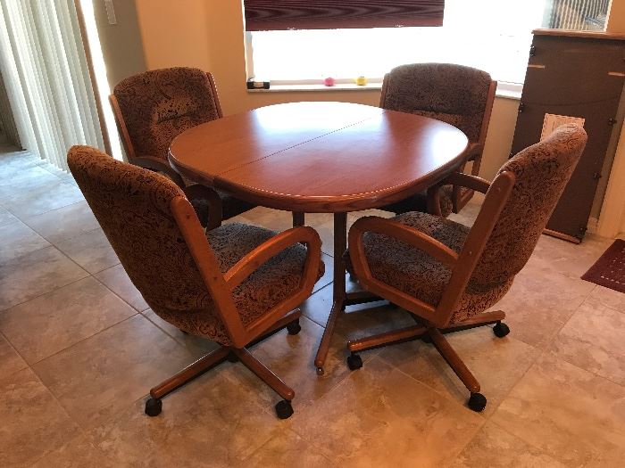 Kitchen table 42"  has two leaves 18" each includes six chairs 