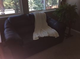 Brown Leather Loveseat.