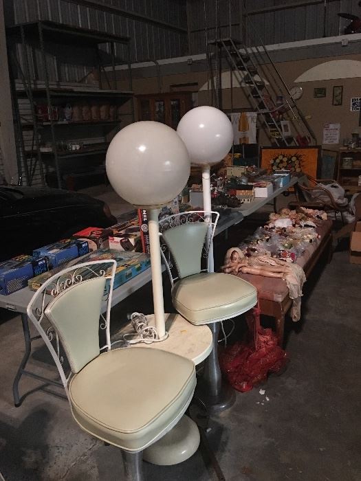 1950s bar stools;
Two exterior lights with globes