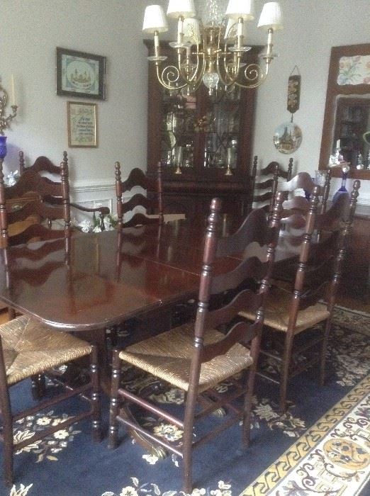 Brandt Furniture Company: Mahogany dining room table with 5 leaves. Dated 1937 on underside. Table is huge. Chairs sold separately.
