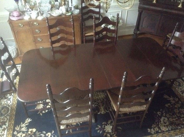 Top view of dining room table. Great condition. Extra leaves stored in front closet.