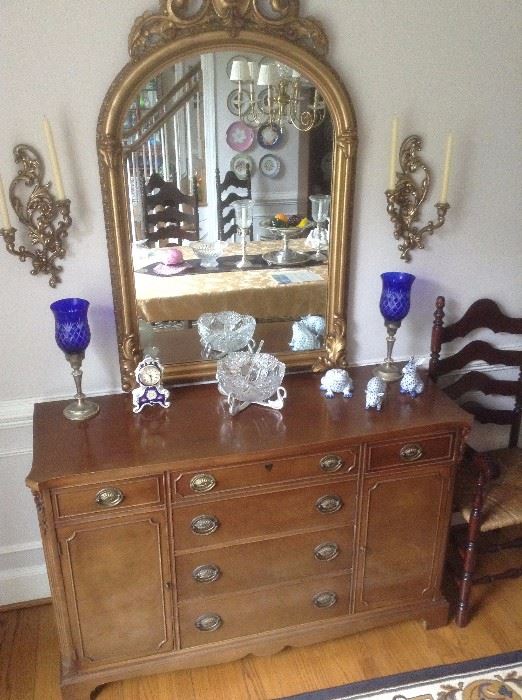 Sideboard located in dining room. Mirror not attached.