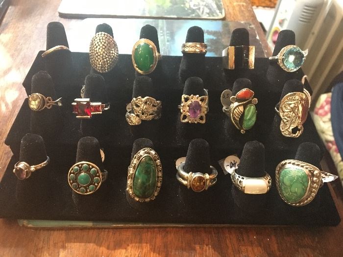 dozens upon dozens of vintage sterling silver rings, some with turquoise and some with semi precious stones, something for everyone!