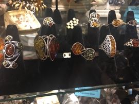 Beautiful custom made sterling silver and honey amber rings, some very large, a must see