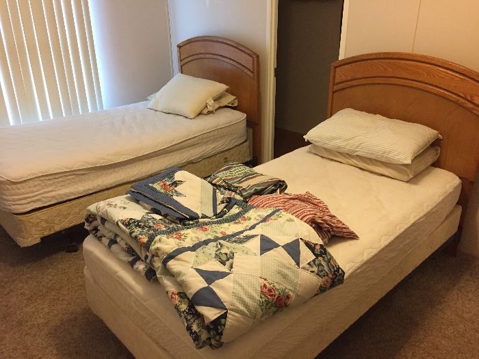 Twin beds.  Headboards, mattresses