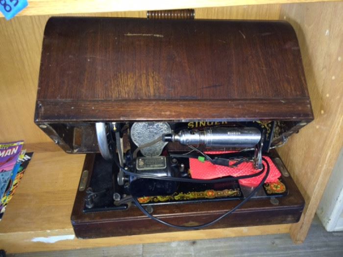 Vintage Singer sewing machine with wooden case