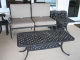 Set consists of:
1 sofa
1 Loveseat
2 chairs
2 tables