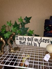 Golfer bookends; golf sign