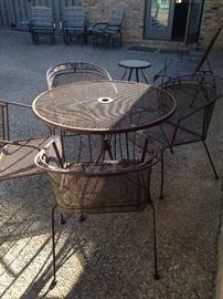 Round patio table with 4 chairs