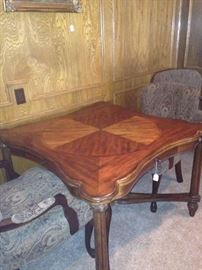 Great game table with 4 upholstered chairs (Each side has a drawer.)
