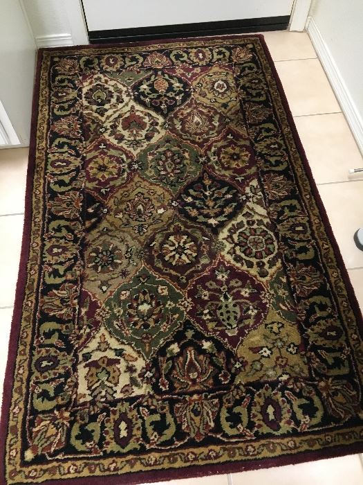 Assorted area rugs in very good condition. 
