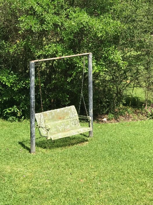 An old metal swing that needs a new home. In good condition.