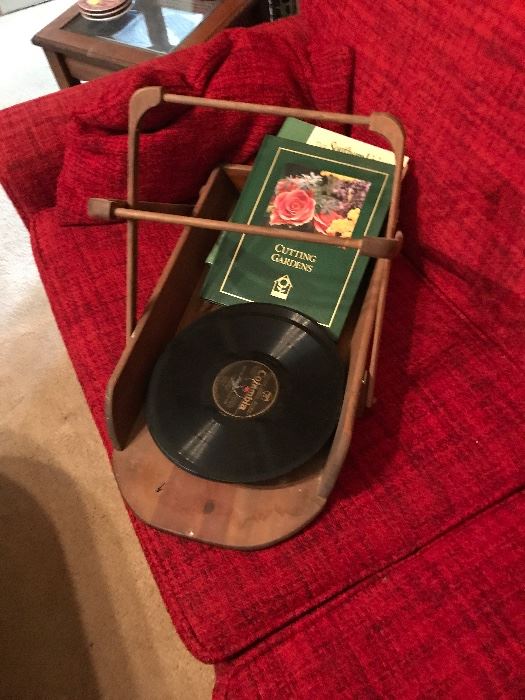 Hand made wooden basket with two handles. Old Victrola 78 records/vinyl.