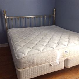 king sized mattress with brasss headboard
