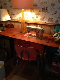 We have 2 vintage sewing cabinets with machines!