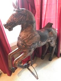  Hand painted mahogany carousel horse 
44"w x 12"d x 51" h